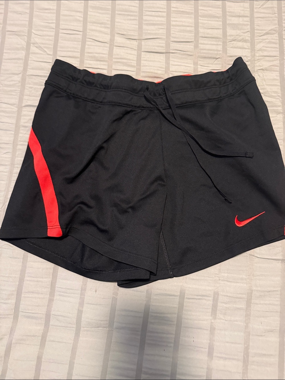 Nike Women's Black Athletic Shorts with Red Accents